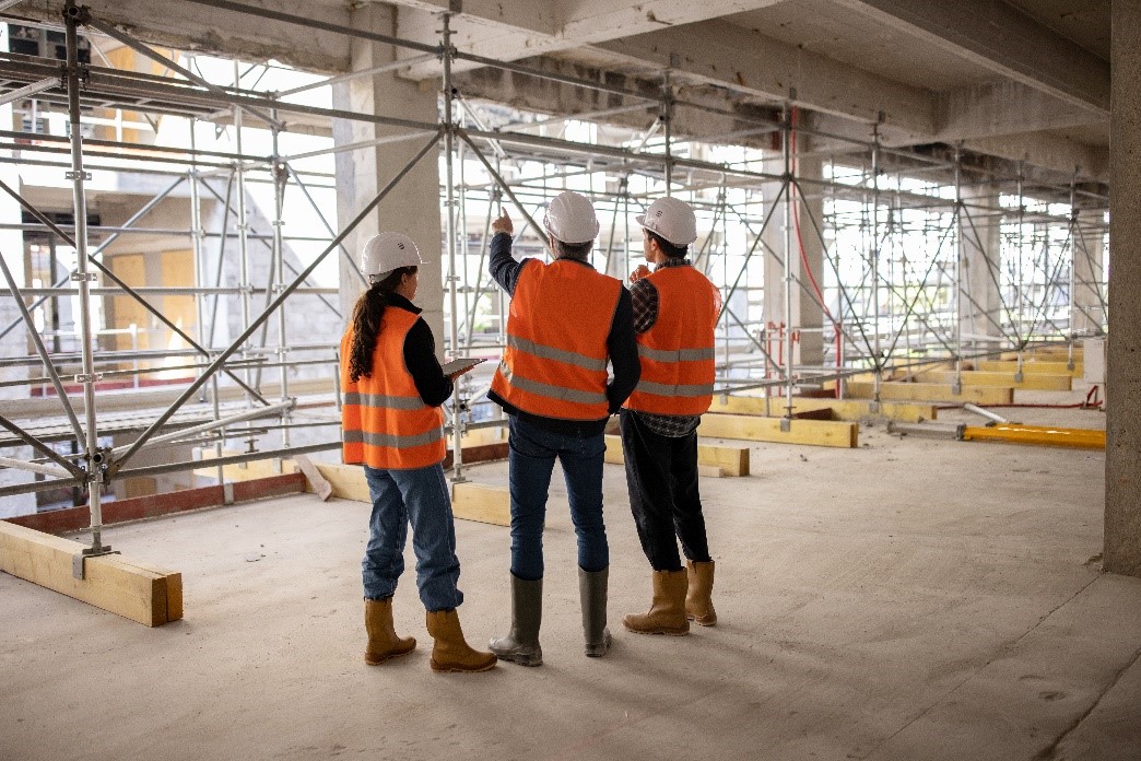 Employees checking the refractory materials